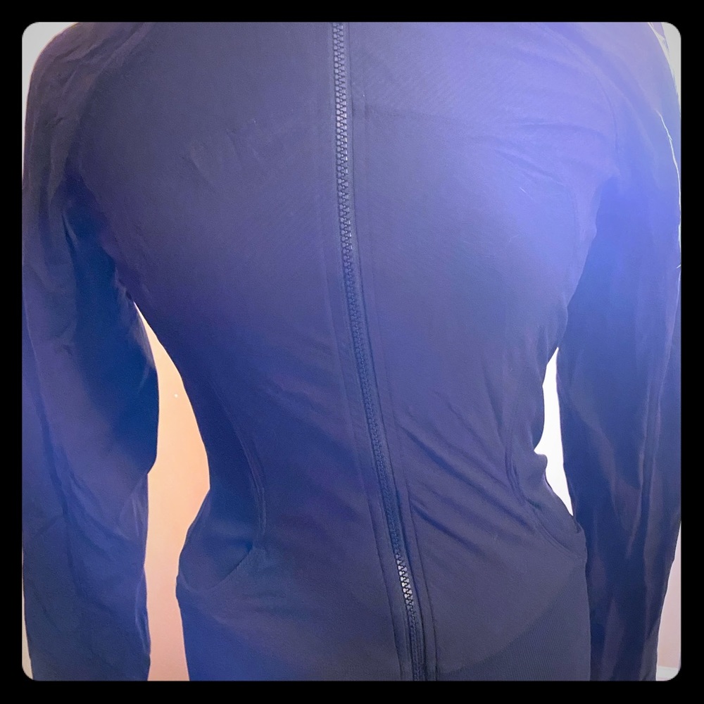 LuluLemon Women’s two-way zip up.